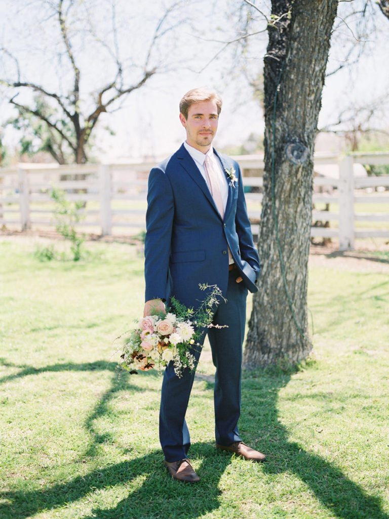 Fine Art Groom, Groom With Bouquet, Springy Bouquet, Fine Art Bouquet, Navy Suit, Fine Art Wedding Arch, Blush Floral Arch, Floral Ceremony Install, Spring Brunch Wedding at The Farm at South Mountain, Fine Art Wedding Inspiration, Spring Wedding Inspiration, Brunch Wedding, Ball Photo Co, Fine Art Wedding, Film Wedding Photography, Fine Art Film, The Farm at South Mountain, Phoenix Wedding Venues, Blush Ivory Green Wedding Palette, Morning Wedding, Phoenix Wedding Photographer, Arizona Wedding Photographer