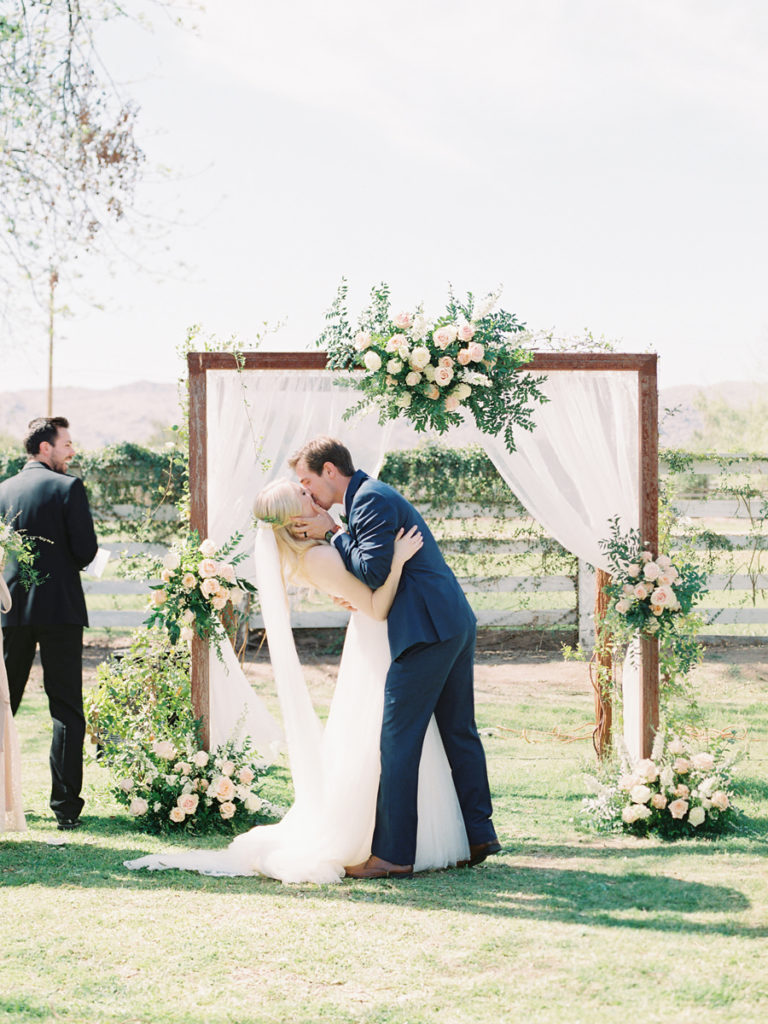 First Kiss, Fine Art Wedding Arch, Blush Floral Arch, Floral Ceremony Install, Spring Brunch Wedding at The Farm at South Mountain, Fine Art Wedding Inspiration, Spring Wedding Inspiration, Brunch Wedding, Ball Photo Co, Fine Art Wedding, Film Wedding Photography, Fine Art Film, The Farm at South Mountain, Phoenix Wedding Venues, Blush Ivory Green Wedding Palette, Morning Wedding, Phoenix Wedding Photographer, Arizona Wedding Photographer
