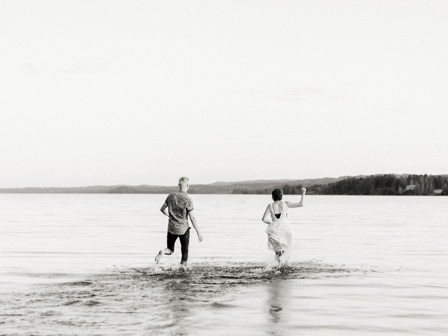 Running in Water, Water Poses, Honeymoon Session in Sunne Sweden, Sweden Sweetheart Session, Sunne Anniversary Session, Sweden Couple Session, Sweden Anniversary Session, Sweden Wedding Photographer, Lake Anniversary Session Europe, Fine Art Film, Film Honeymoon Session, Cute Couple Poses, Romantic Engagement Poses, Bride and Groom Poses, Film Photography, Short Hair Bride, Cancer Survivor, Swedish Groom, Europe Honeymoon Session, Europe Anniversary Session, Ball Photo Co