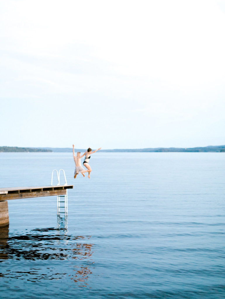 Jumping Into the Lake, Dock, Bathing Suit Honeymoon Session, Honeymoon Session in Sunne Sweden, Sweden Sweetheart Session, Sunne Anniversary Session, Sweden Couple Session, Sweden Anniversary Session, Sweden Wedding Photographer, Lake Anniversary Session Europe, Fine Art Film, Film Honeymoon Session, Cute Couple Poses, Romantic Engagement Poses, Bride and Groom Poses, Film Photography, Short Hair Bride, Cancer Survivor, Swedish Groom, Europe Honeymoon Session, Europe Anniversary Session, Ball Photo Co