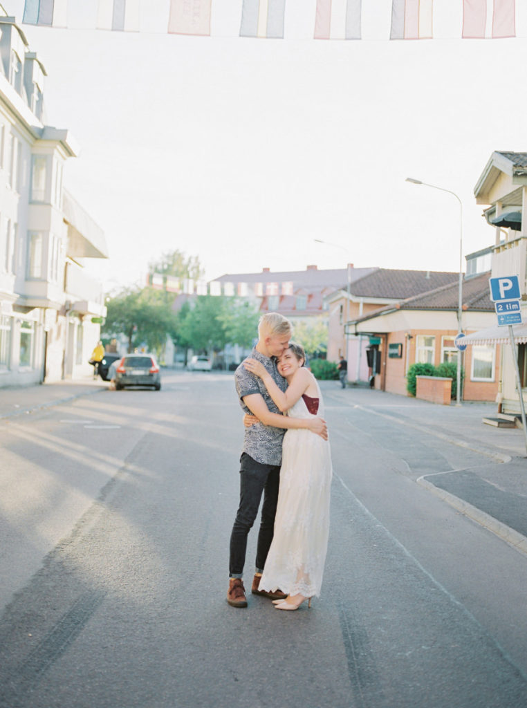 Dancing in the Street, Honeymoon Session in Sunne Sweden, Sweden Sweetheart Session, Sunne Anniversary Session, Sweden Couple Session, Sweden Anniversary Session, Sweden Wedding Photographer, Lake Anniversary Session Europe, Fine Art Film, Film Honeymoon Session, Cute Couple Poses, Romantic Engagement Poses, Bride and Groom Poses, Film Photography, Short Hair Bride, Cancer Survivor, Swedish Groom, Europe Honeymoon Session, Europe Anniversary Session, Ball Photo Co