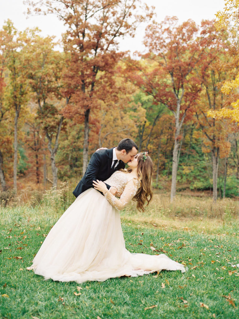 Dip photo, romantic must have wedding poses, fall colors, long sleeve beaded fine art wedding dress, must have wedding shots, Rainy Wedding Day, Silver Oaks Chateau Wedding, St Louis Wedding Photographer, Missouri Wedding Photographer, Film Wedding Photography, Fine Art Wedding, Destination Wedding Photographer, Ball Photo Co, Fall Wedding Inspiration, Castle Wedding Venue, Midwest Wedding, Old World Wedding Inspiration, Pentax 645N, Portra 800, Organic Berry Wedding, Berry tone color palette, Burgundy Forest Green Wedding
