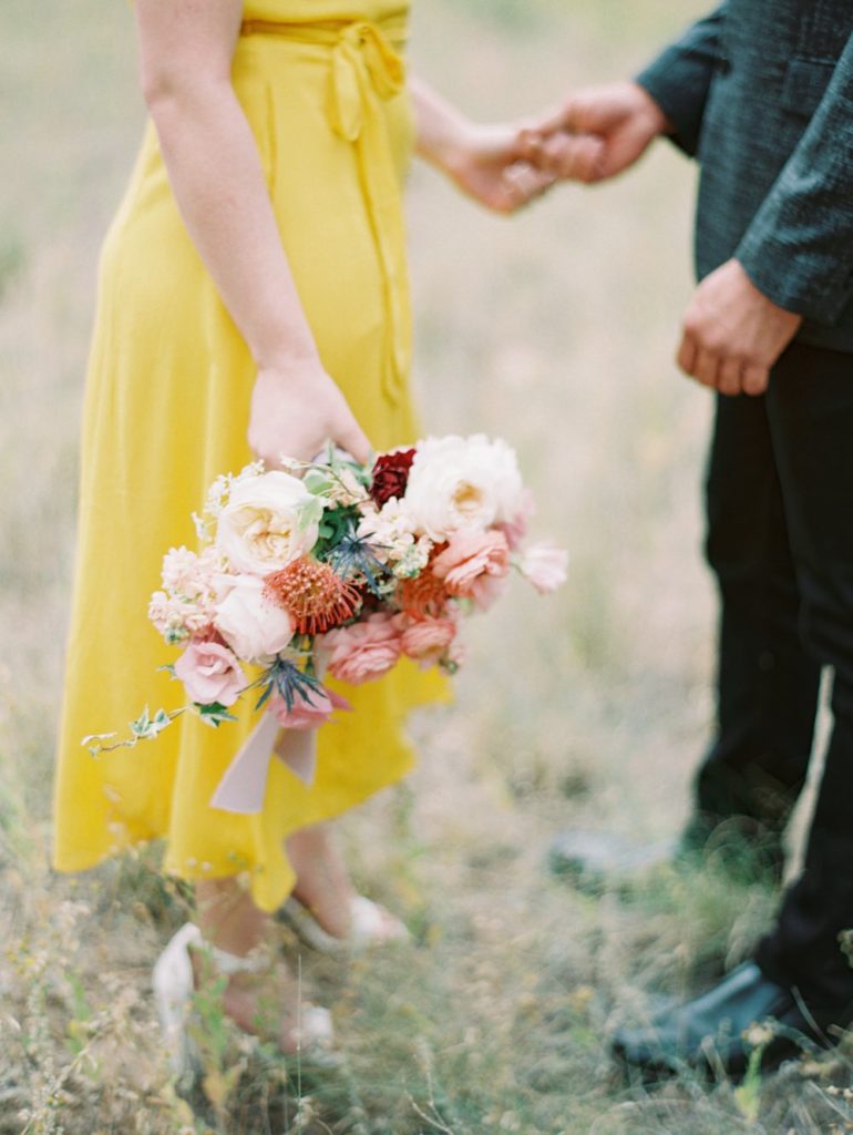 Engagement Session Bouquet, Peachy Summer Bouquet, Garden Roses, Ranunculus, Lisianthus, Carnations, Thistle, Sedona West Fork Trail Engagement Session, Sedona Mountain Engagement, Rainy Fall Engagement Session Inspiration, Light Brown Hair Styles, Yellow Engagement Dress, Engagement Outfit Inspiration, Mountain Hiking Trail Engagement Session, Ball Photo Co, Yellow Nordstrom Sun Dress, Film Engagement Session, Photos on Film, Wedding Photography on Film, Fine Art Film, Fine Art Engagement Session, Fine Art Bride & Groom
