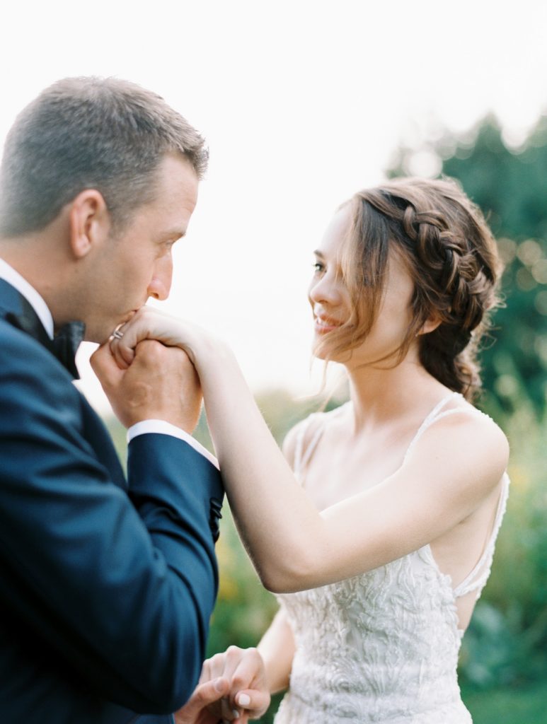 Golden Hour, Brunette Bride, Cute Bride and Groom Poses, Romantic Wedding Poses, Winery Wedding, Vineyard Wedding, Bridal Makeup, Gorge Crest Vineyards Washington Wedding, Gorge Wedding Venues, Late Summer Wedding, Ball Photo Co, Film Wedding Photography, Fine Art Film, Fine Art Wedding, PNW Wedding Photographer, Portland Wedding Photographer, Washington Wedding Photographer, Destination Wedding, Intimate Small Wedding, Epic Views, Fun Wedding Photos, Film Wedding Photographer, Fine Art Bride, Anomalie Wedding Dress, High End Wedding, Green and White Wedding Color Palette, Soft Romantic Intimate Nostalgic Wedding, Groom Kissing Bride's Hand